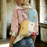 "Blusa Vintage com Estampa Floral" can be rewritten as "Blusa Retro com Design Floral".