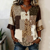 "Blusa Vintage com Estampa Floral" can be rewritten as "Camisa Vintage com Design Floral".