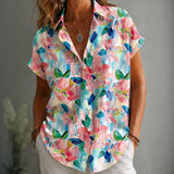 "Camisa Vintage com Estampa Floral" can be rewritten as "Camisa Retro com Design Floral".