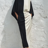 Conjunto de dois peças com top e saia midi em contraste de cor branco e preto