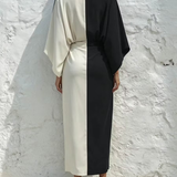 Conjunto de dois peças com top e saia midi em contraste de cor branco e preto