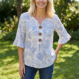 "Blusa Vintage com Estampa Floral" can be rewritten as "Blusa Vintage com Design Floral".