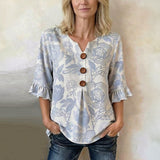 "Blusa Vintage com Estampa Floral" can be rewritten as "Blusa Vintage com Design Floral".