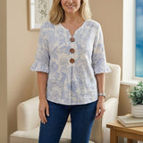 "Blusa Vintage com Estampa Floral" can be rewritten as "Blusa Vintage com Design Floral".