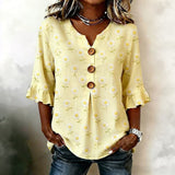 "Blusa Vintage com Estampa Floral" can be rewritten as "Camisa Vintage com Design Floral".