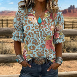 "Blusa Vintage com Estampa Floral" can be rewritten as "Camisa Vintage com Design Floral".