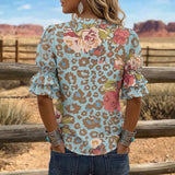 "Blusa Vintage com Estampa Floral" can be rewritten as "Camisa Vintage com Design Floral".