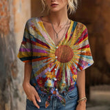 "Blusa Vintage com Estampa Floral" could be rewritten as "Blusa Retro com Design Floral".