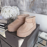 Botas de plataforma forradas en color beige Nina