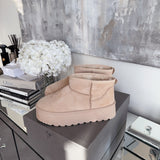 Botas de plataforma forradas en color beige Nina