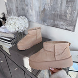 Botas de plataforma forradas en color beige Nina