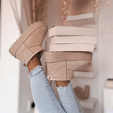Botas de plataforma forradas en color beige Nina