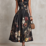 Vestido midi em cetim preto com pregas, estampa floral e decote em gota
