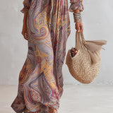Vestido longo em chiffon com estampa paisley, decote em V, franzido