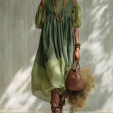 Vestido midi verde em chiffon com ombros à mostra e mangas curtas
