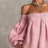 Violette | Vestido curto rosa em estilo trapézio com mangas bufantes e ombros à mostra
