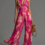 Macacão fúcsia com flores em chiffon, sem mangas, com fecho e pernas largas