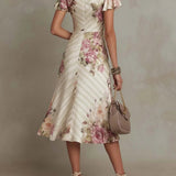 Vestido midi de cetim floral, elegante e com toque retrô